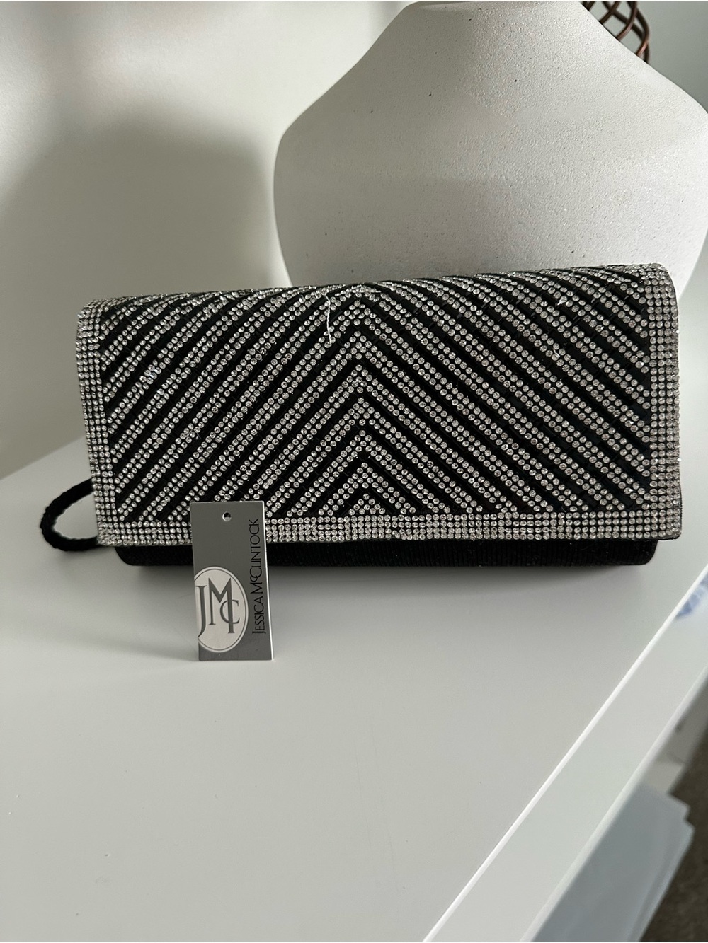 Jessica McClintock Black Clutch with Silver Crystal Chevron Detail
